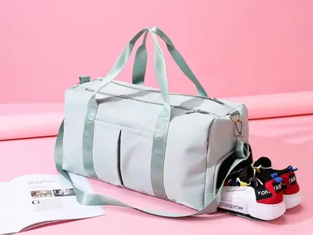 A stylish and durable duffel bag with a spacious main compartment, sturdy handles, and a sleek design—perfect for travel, gym, or everyday use