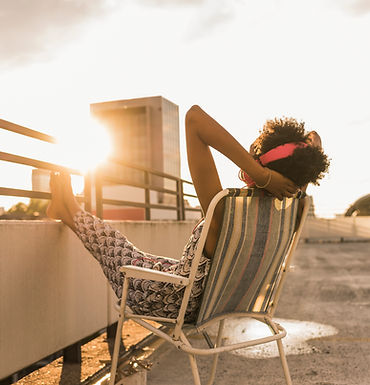 Woman Sitting on Roof