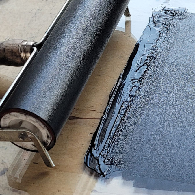 Printmaking roller inked up 
