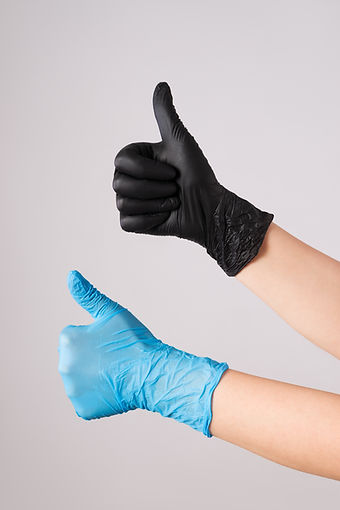 human-hand-latex-gloves-grey-wall-outbreak-coronavirus-disease-2019-covid-19.jpg