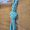 Thumbnail: Blue and natural coloured dog tug toys with a monkey knot centre and two plaited handles either side for pulling and tugging.