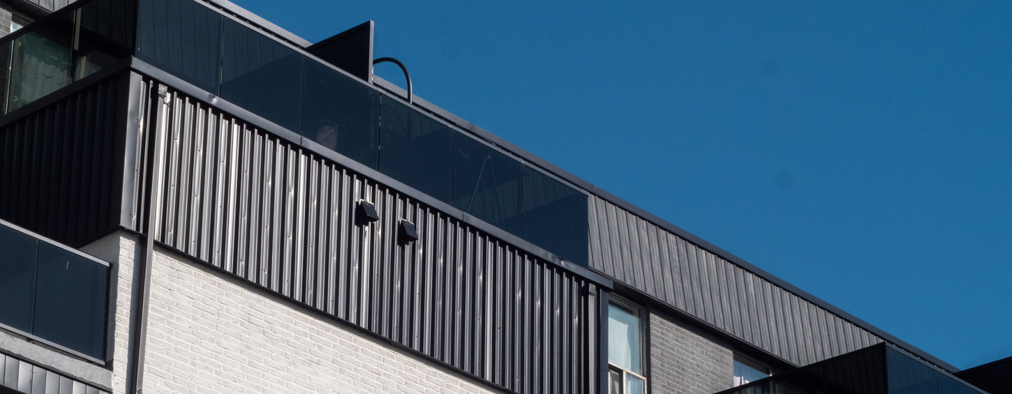 grey building with balconies
