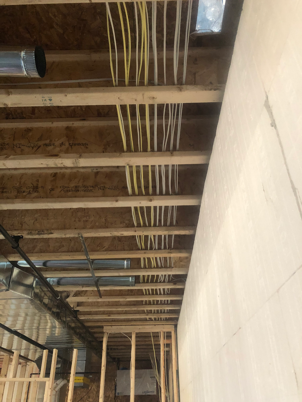 Electrical wiring in wooden ceiling frame