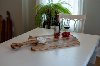 The light coloured charcuterie board with handle