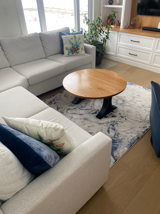 Custom crafted, circular wooden coffee table with short legs