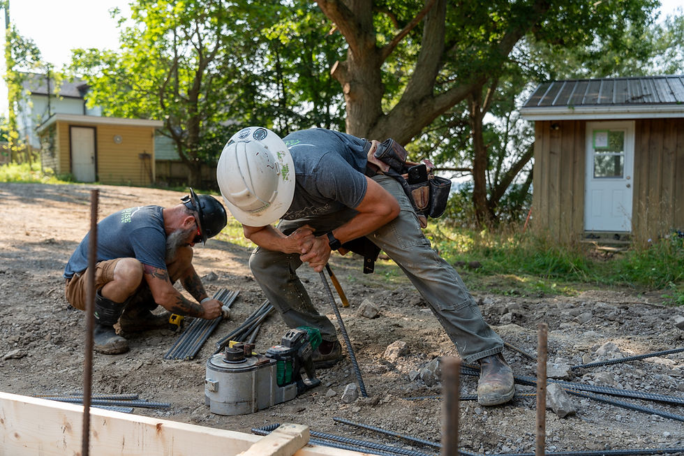 labourer installing footing on site