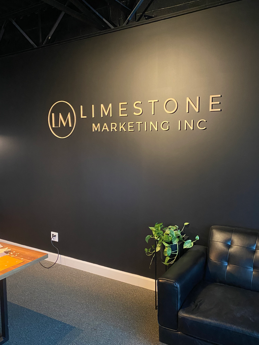 Custom branded wooden sign for a business.