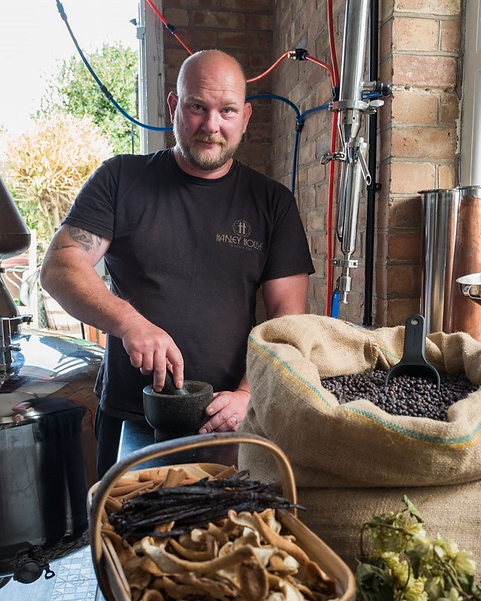Our Creative Distiller Adam in our home distillery.png