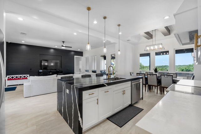 Modern open-plan kitchen and living room.