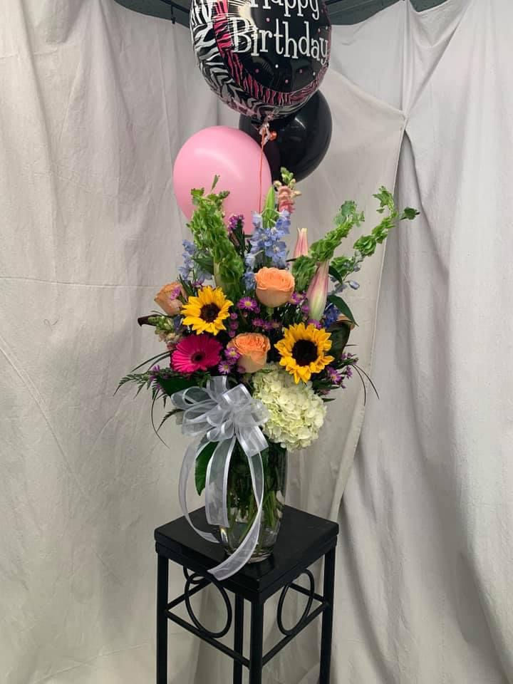 Birthday arrangements with balloons š