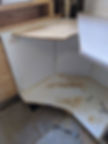 Deconstructing Corner Cabinet to Access Mitre Bolts on Laminate Countertop
