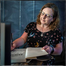 signing books (Jerry Manco).jpeg