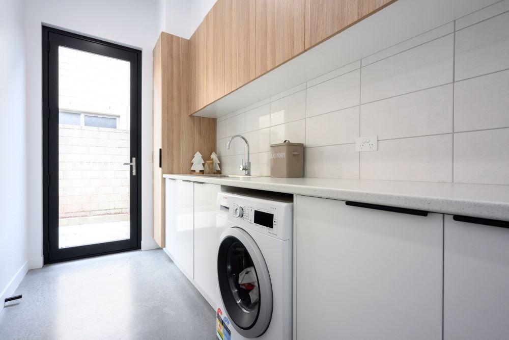 New laundry in a custom home built by Roberts Builders in Port Campbell