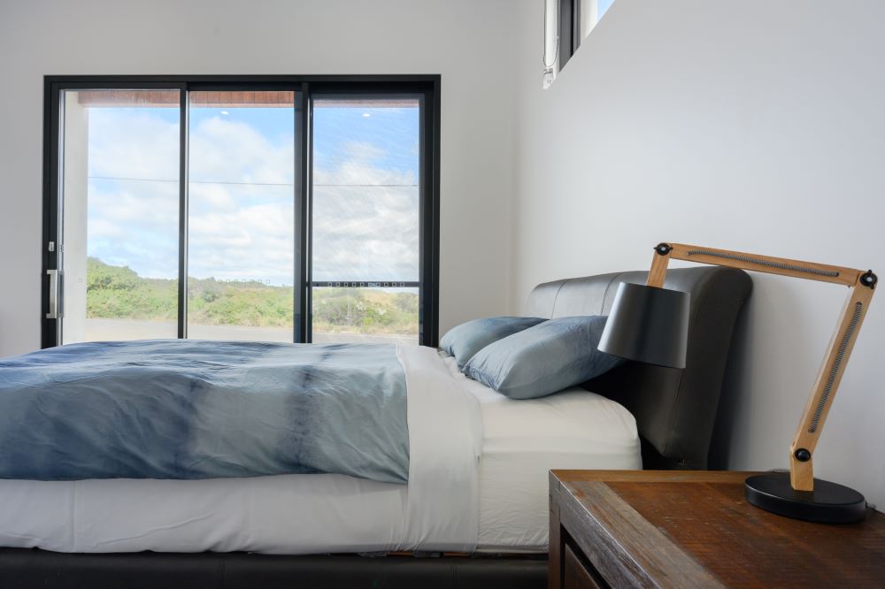 Bedroom in a new custom home built by Roberts Builders in Port Campbell