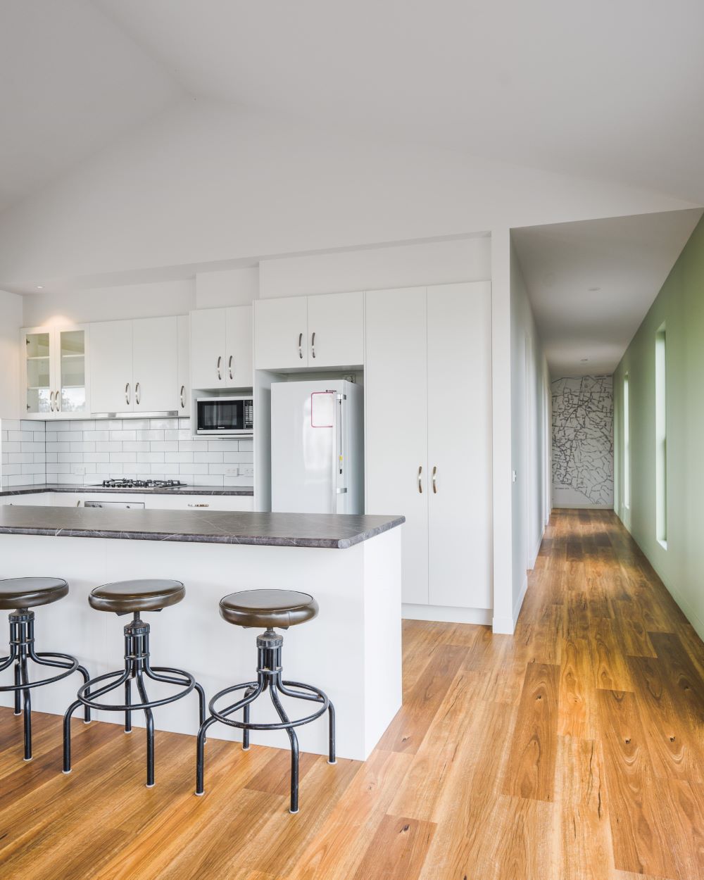 Kitchen and hallway view of a new home in Cobden, Victoria built by Roberts Builders Pty Ltd.