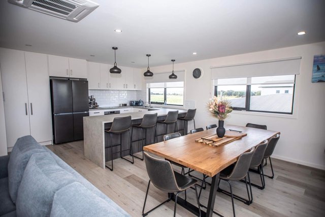 Dining room and kitchen in a new home built by Roberts Builders in Peterborough, Victoria.
