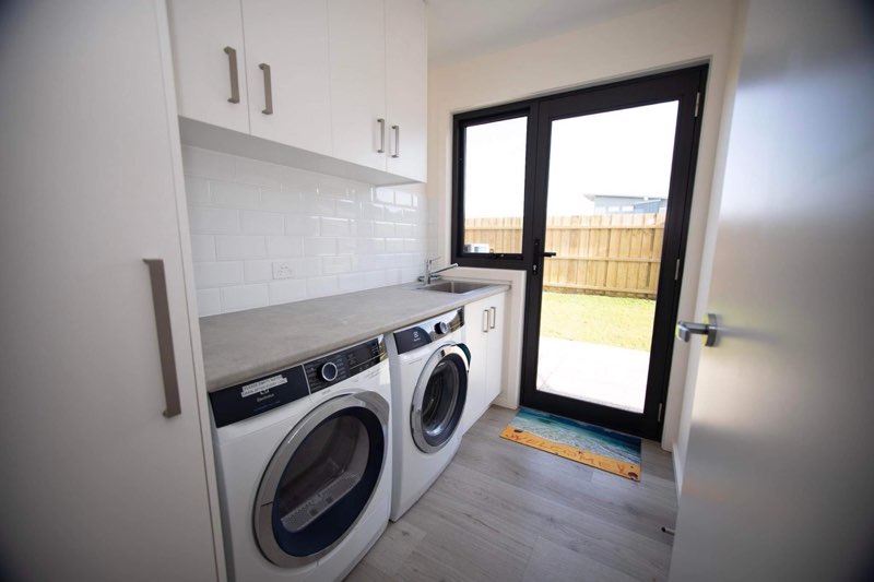 Laundry in a new home built by Roberts Builders in Peterborough, Victoria.