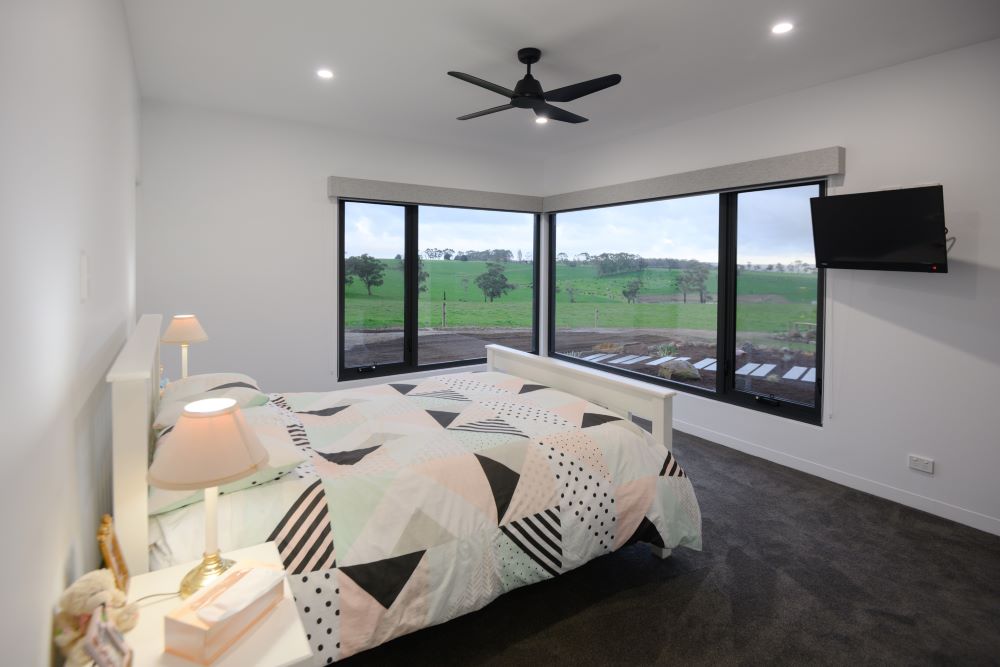 Bedroom in a new home in Glenfyne, Victoria built by Roberts Builders Pty Ltd.