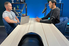 DUBAI PODCAST STUDIO LAYOUT WITH A PICTURE OF CLIENTS RECORDING THEIR PODCAST