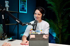 DUBAI PODCAST STUDIO LAYOUT WITH A PICTURE OF CLIENTS RECORDING THEIR PODCAST