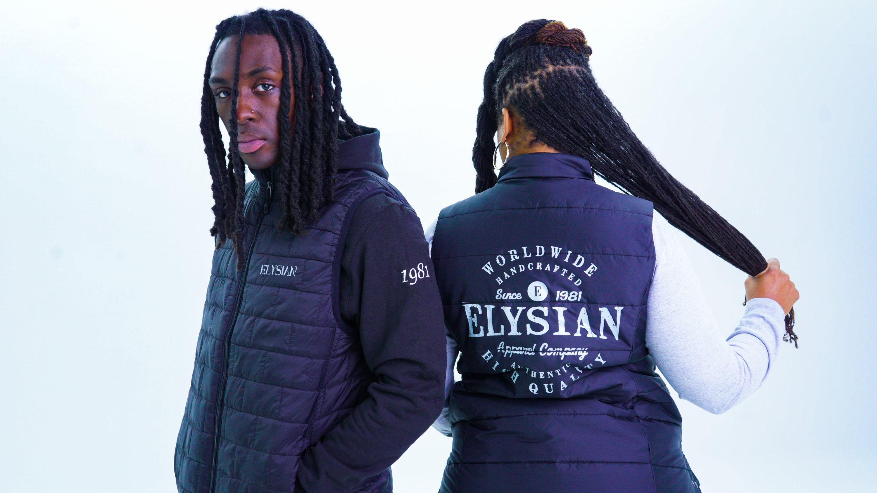 This is our  Elysian BB Stamp Vest with a white Elysian logo on Model.