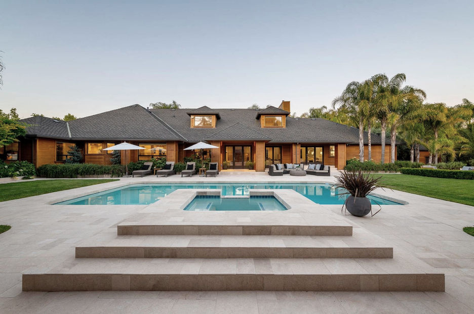 Single-story custom estate design by MASTRIDICASA with pool terrace, indoor-outdoor living spaces, practical site planning, and permit-ready residential construction documents.