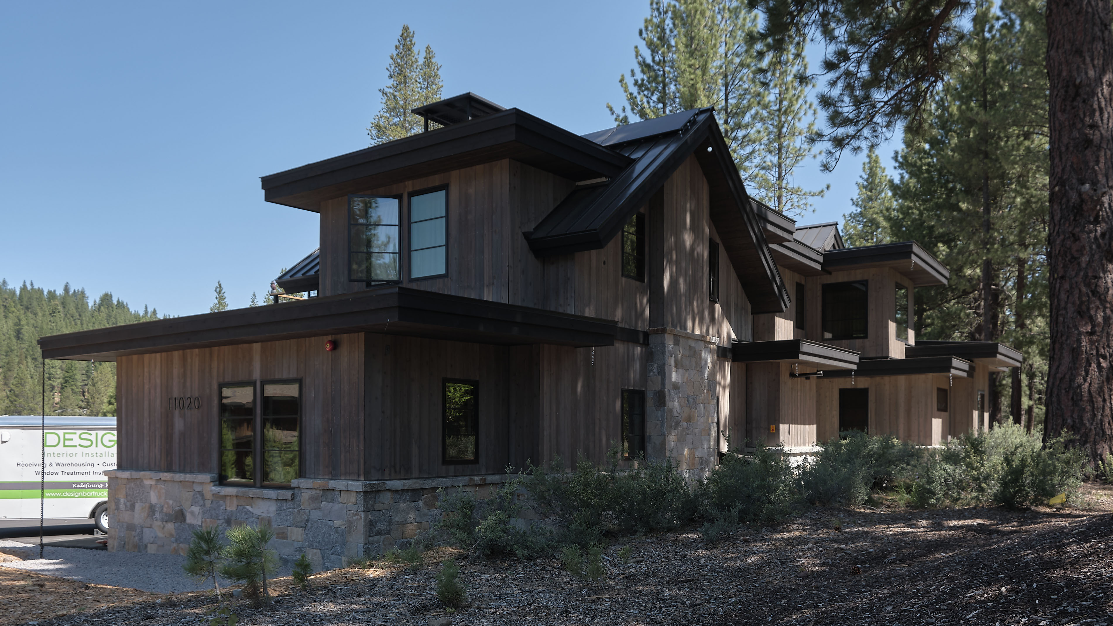 Streetview of our modern farmhouse residential design for in Gray's Crossing Truckee CA, designed by the Architect Alternative MASTRIDICASA