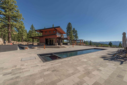Hillside estate design by MASTRIDICASA with pool terrace, expansive glazing, indoor-outdoor living, view-oriented site planning, and permit-ready residential construction documents.