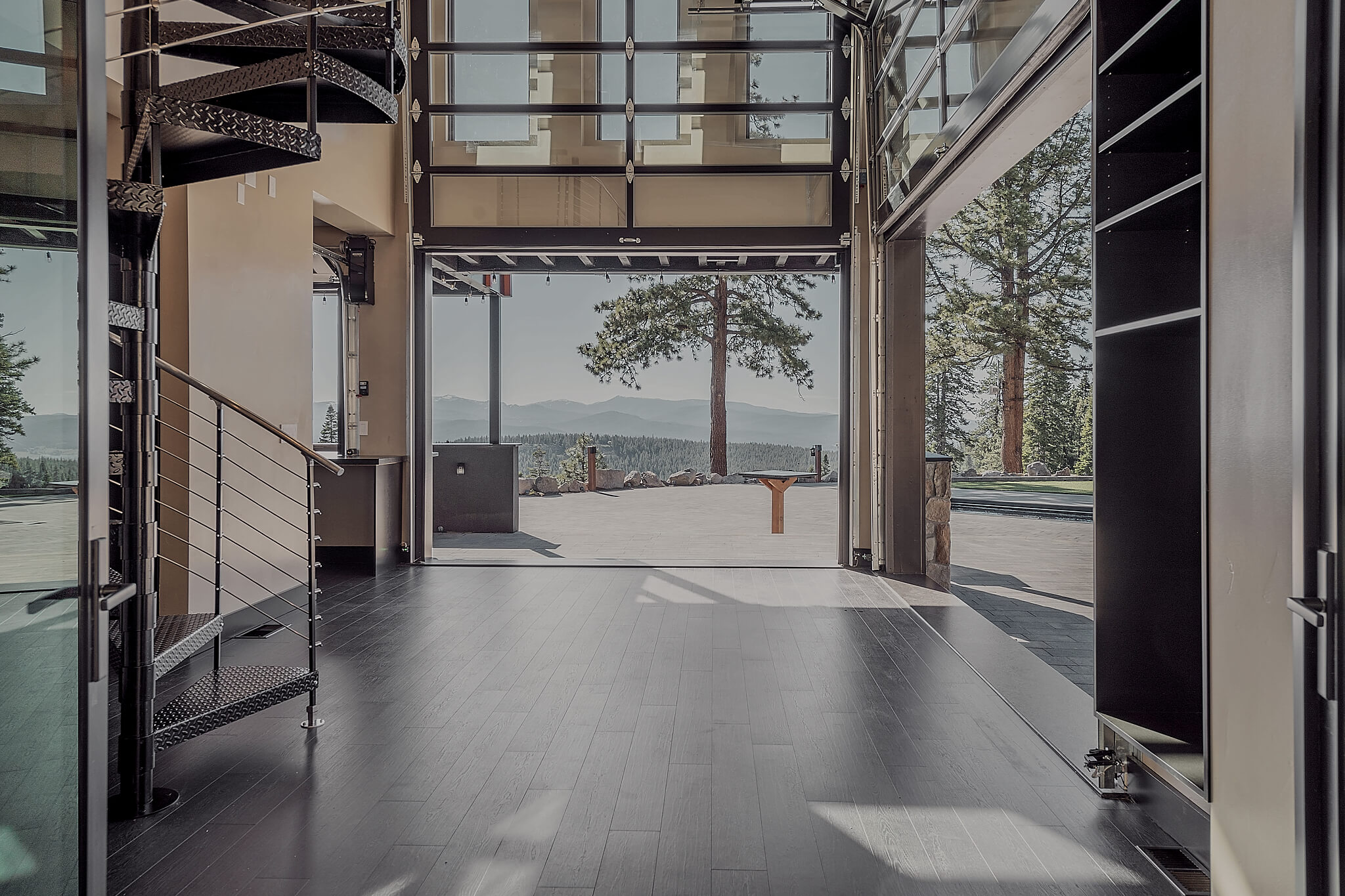 Interior view of our mountain modern pool house residential design for in Martis Peak Estates Truckee CA, designed by the Architect Alternative MASTRIDICASA