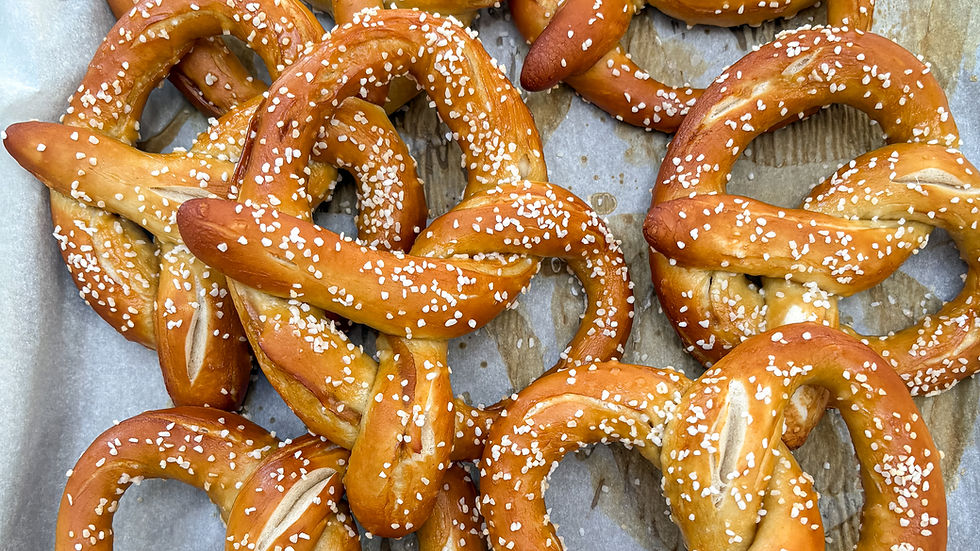 Freshly baked soft pretzels topped with coarse salt