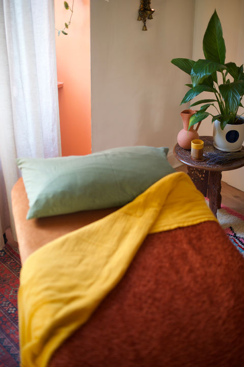 Close up of massage couch and pillow 