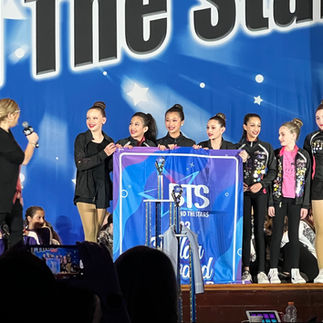 Dancers on stage at competition for awards