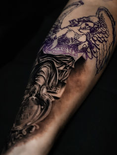 Realistic black&grey angel statue tattoo