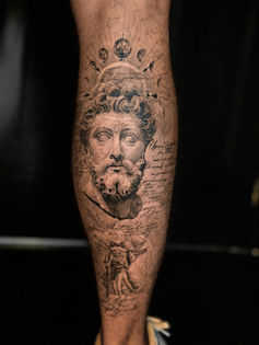 conceptual Marcus Aurelius calf tattoo 