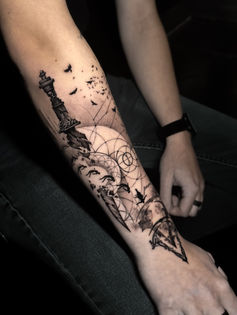 conceptual assassins creed arm tattoo 