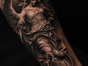 realistic black&grey angel statue tattoo