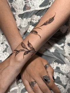 botanical arm tattoo