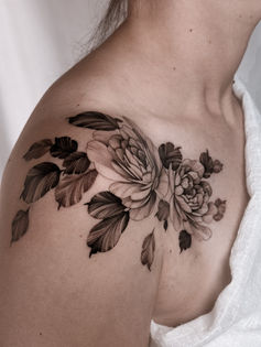 floral freehand shoulder tattoo
