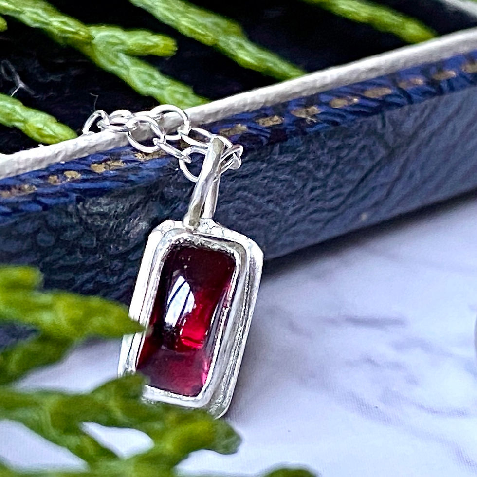 Venue24_TrudyDredge_Garnet and silver pendant.jpeg