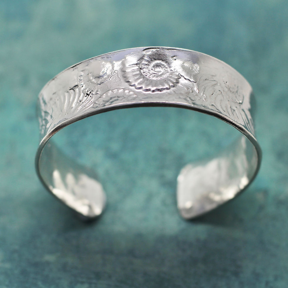 Statement cuff bracelet with fossil ammonite texture