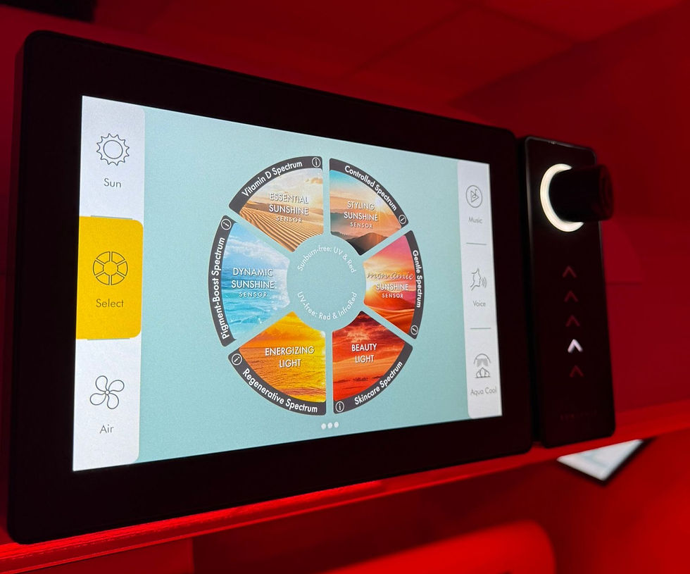 Touchscreen control panel with a circular menu displaying options like "Dynamic Sunshine" and "Essential Sunshine." Red-lit background.