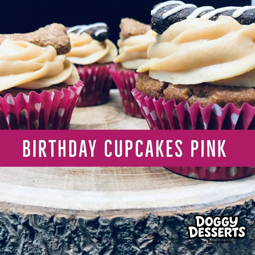 Box of 4 dog cupcakes with peanut butter icing, topped with handmade biscuit bones and presented in pink polka dot cases