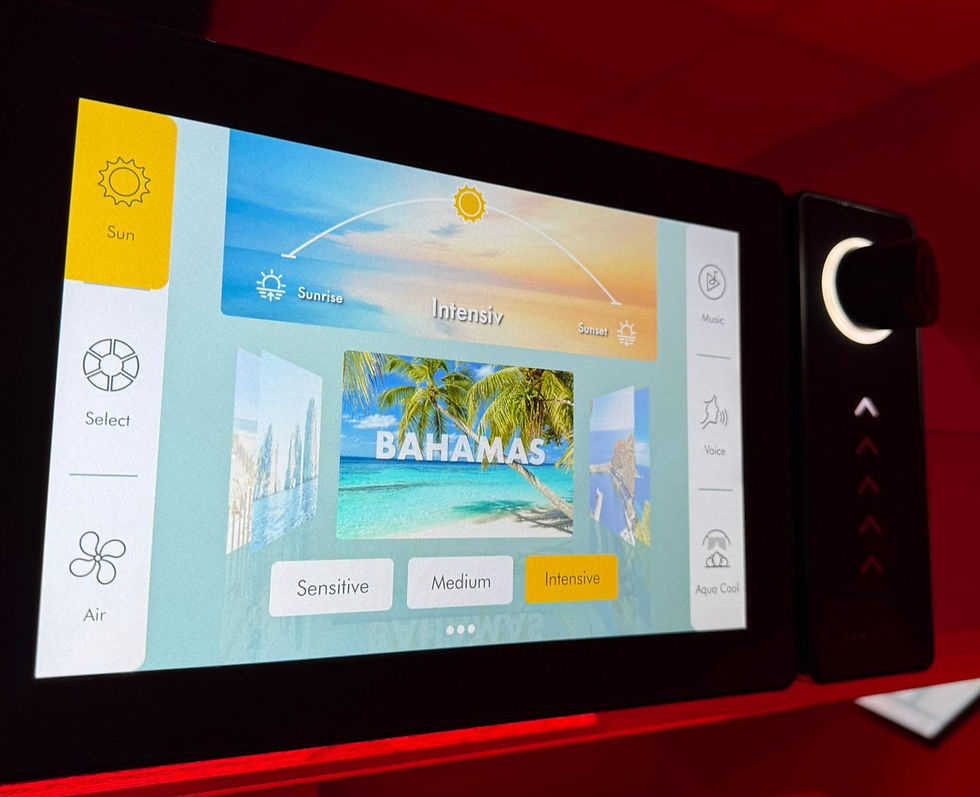 Touchscreen displaying a tropical beach scene labeled "BAHAMAS" with options for sun intensity and settings. Background is shades of red.
