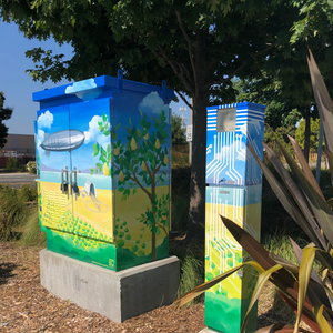 Beautiful acrylic painted utility box in Sunnyvale featuring Moffett Field Hanger One, pear orchards, circuit board imagery