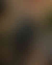 man/chooee holds mog wearing vest in outside store bali lane singapore stylish apparel shop