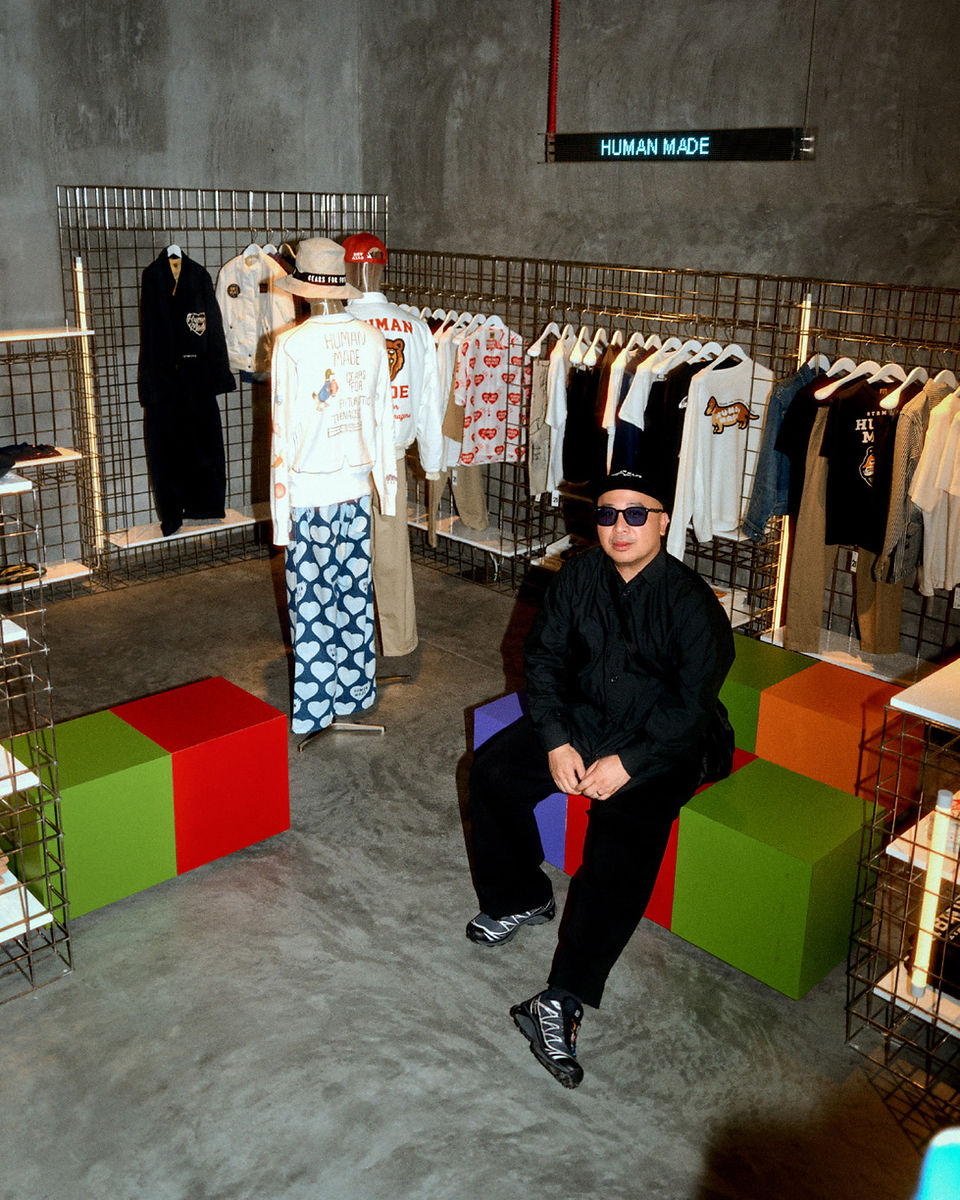 man in como appsrel store featuing human made brand clothing
