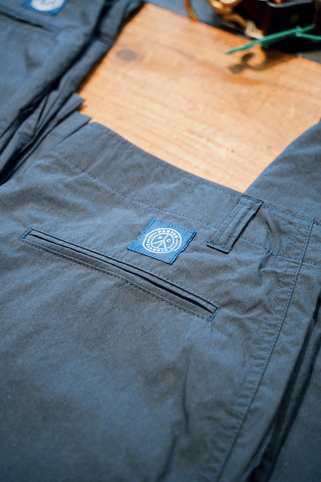 details on grey trousers inside billy's shibuya store tokyo