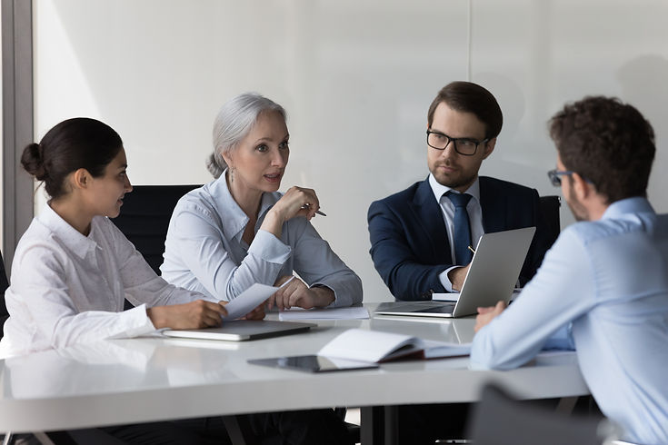 Diverse recruit team meeting, talking to job candidate for interview. HR group searching s