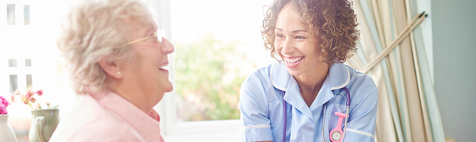 Pharmacist and Patient Laughing