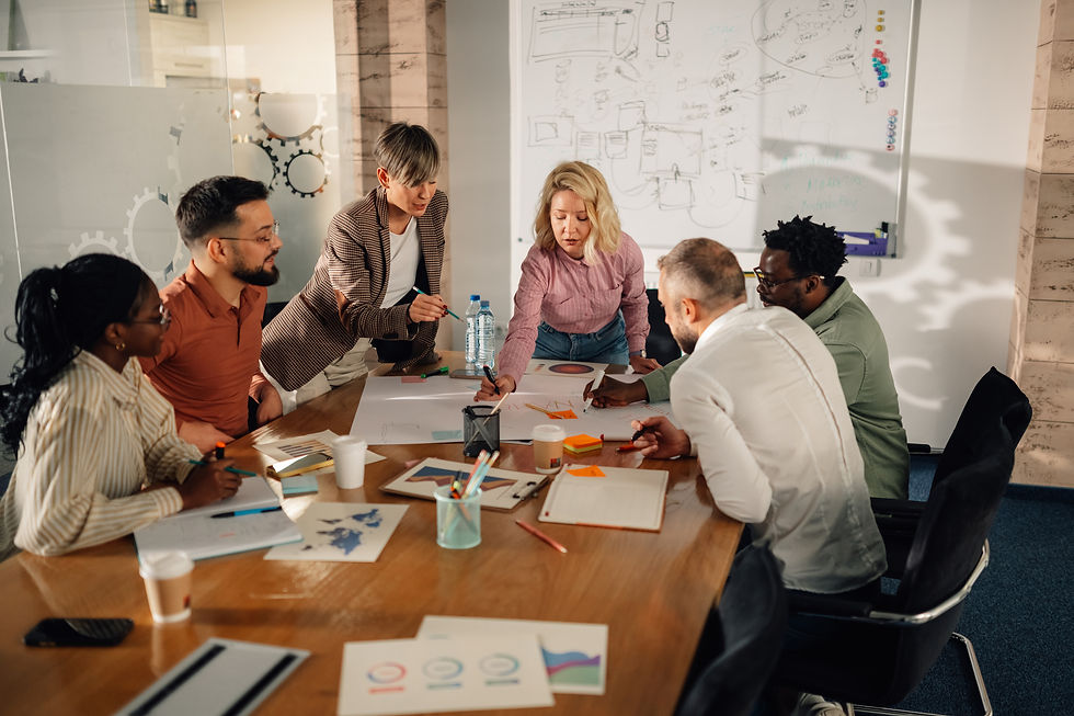 High angle view of a business meeting with marketing professionals discussing strategy